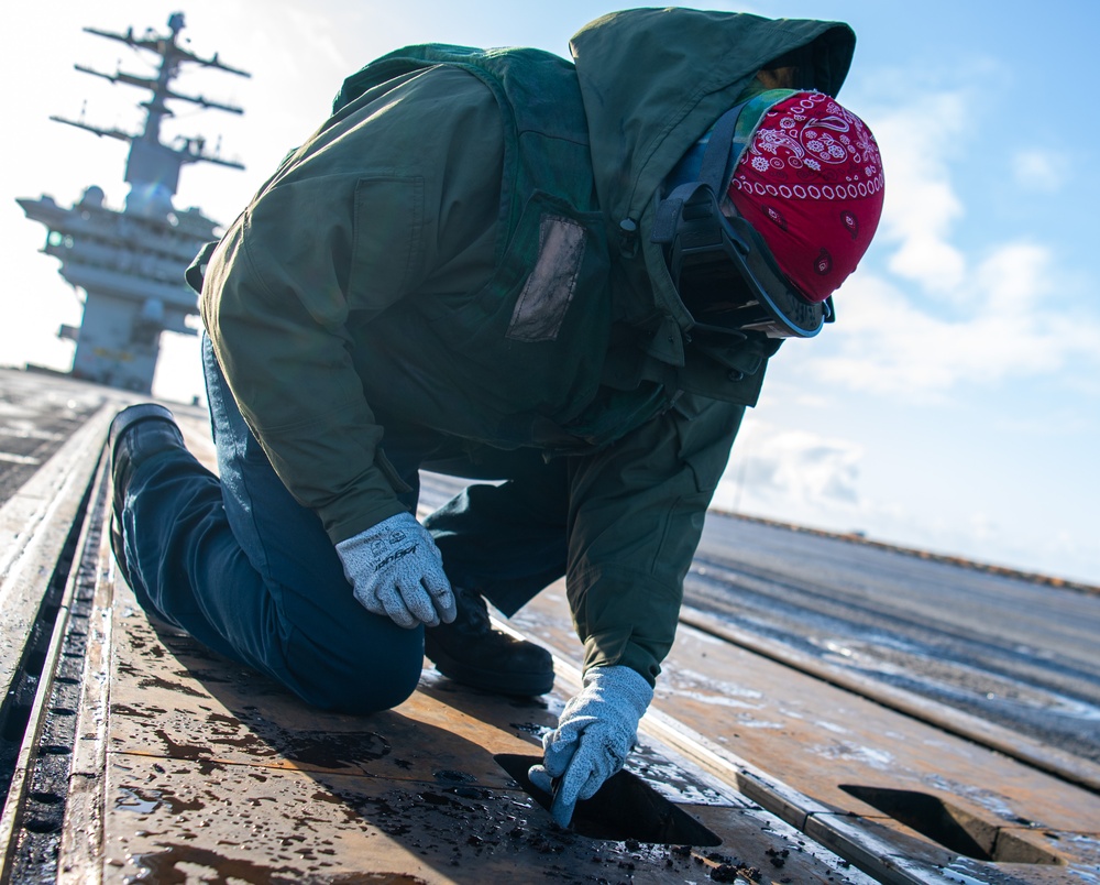 Sailor Cleans Catapult