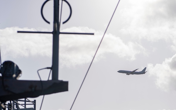 P-8A Flies Alongside Nimitz