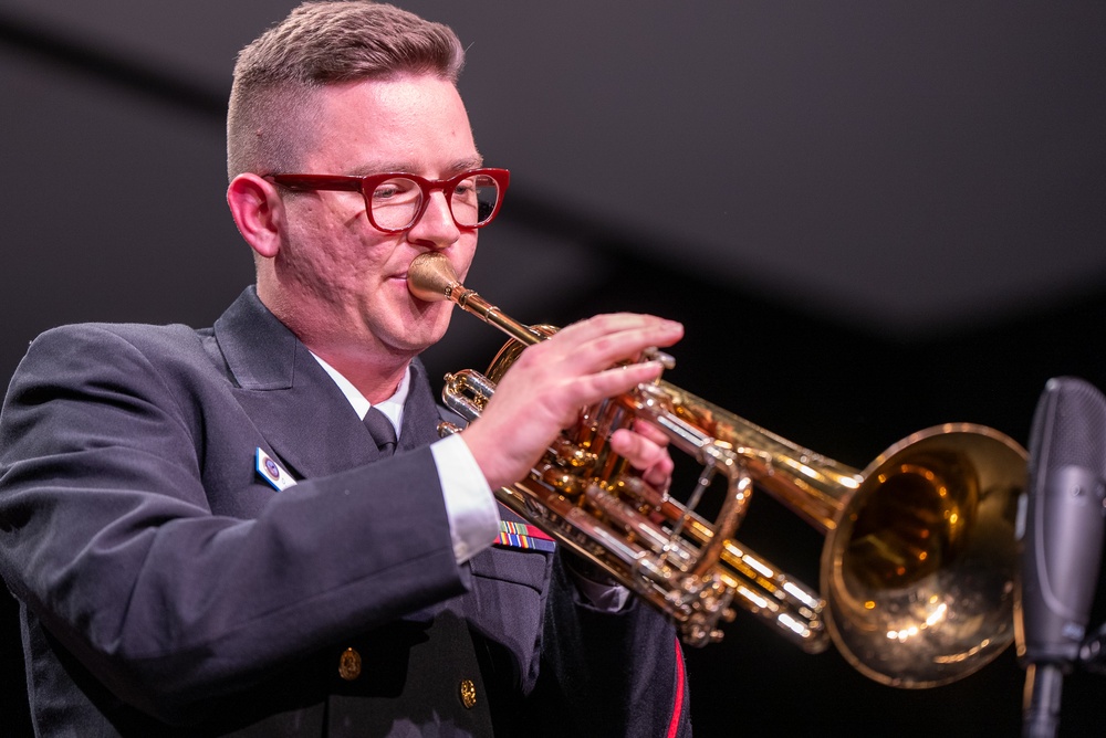 Musician 1st Class David Kapral performs on the bass trumpet at Asheboro High School