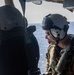USS Ronald Reagan (CVN 76) Sailors reenlist during a flight in an MH-60S Sea Hawk, attached to Helicopter Sea Combat Squadron (HSC) 12