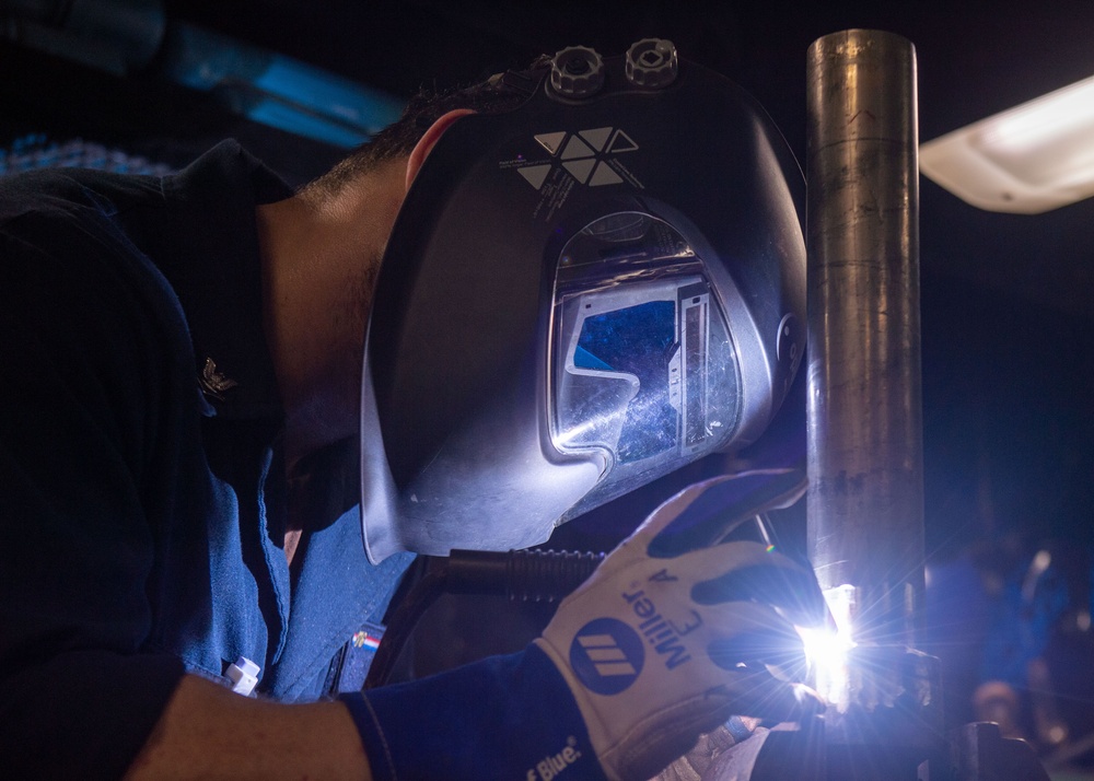 USS Ronald Reagan (CVN 76) Sailors perform corrective maintenance in support of USS Antietam (CG 54)