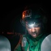 Sailor cleans MH-60S Sea Hawk aboard USS Carl Vinson