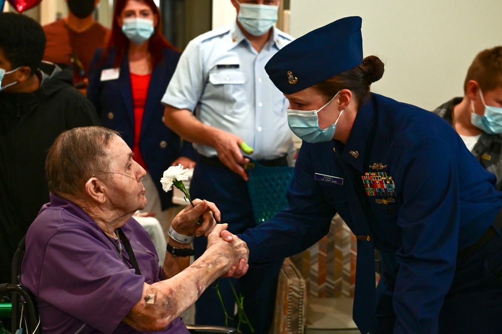 Coast Guardsmen in the Hampton Roads area celebrate Veterans Day at local senior centers