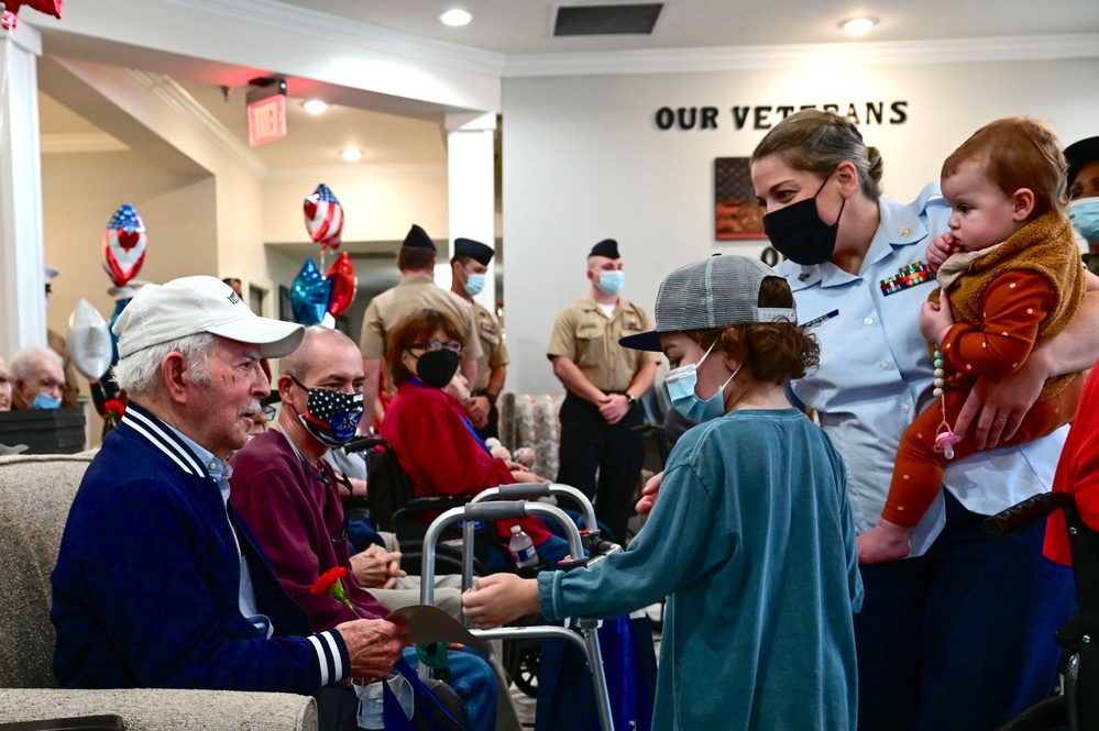 Coast Guardsmen in the Hampton Roads area celebrate Veterans Day at local senior centers