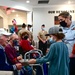 Coast Guardsmen in the Hampton Roads area celebrate Veterans Day at local senior centers