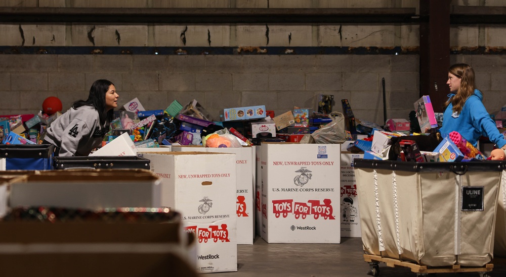 Quantico Marines volunteer with Toys for Tots