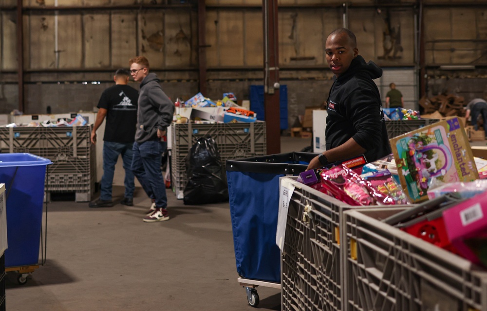 Quantico Marines volunteer with Toys for Tots