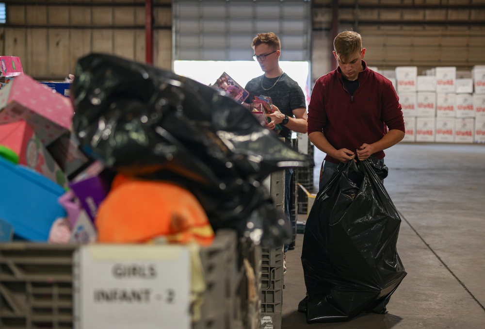 Quantico Marines volunteer with Toys for Tots