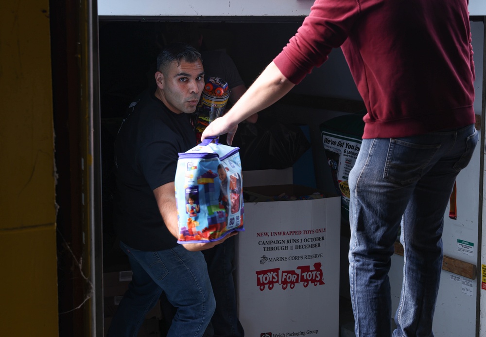 Quantico Marines volunteer with Toys for Tots