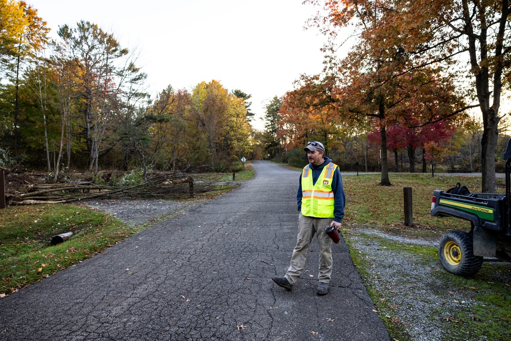 USACE Shenango Maintenance Mechanic clears brush to expand campsites.