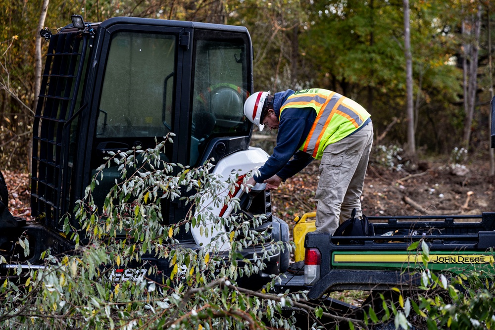 USACE Shenango Maintenance Mechanic clears brush to expand campsites.