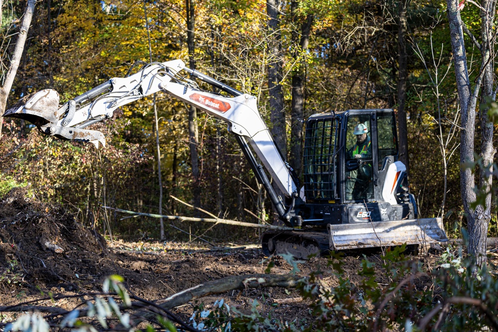 USACE Shenango Maintenance Mechanic clears brush to expand campsites.