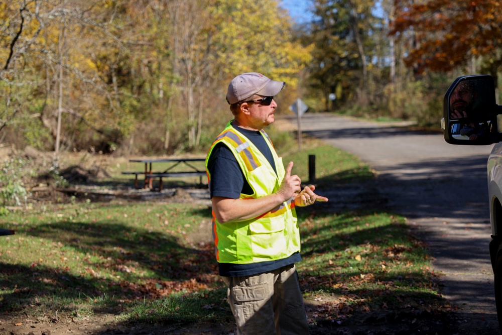 USACE Shenango Maintenance Mechanic clears brush to expand campsites.