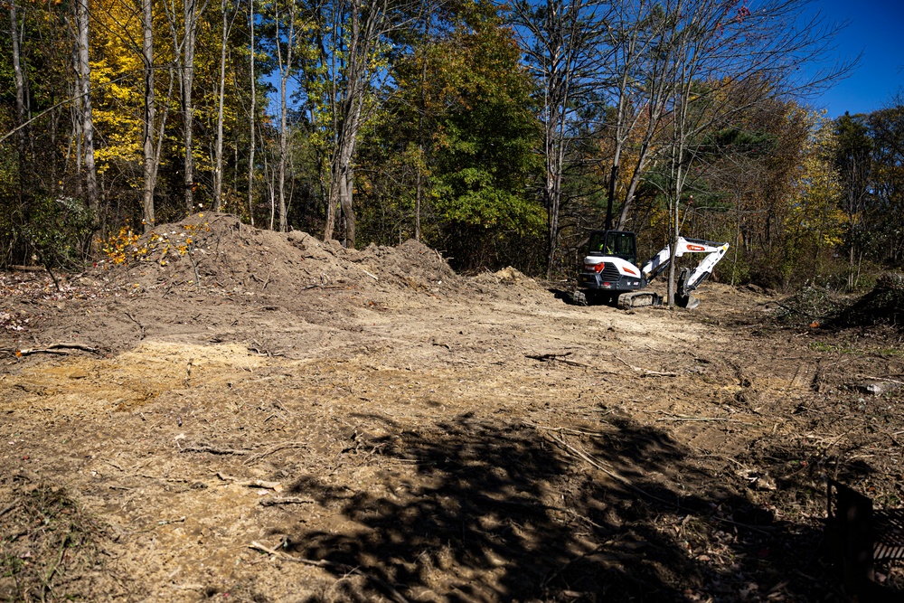 USACE Shenango Maintenance Mechanic clears brush to expand campsites.