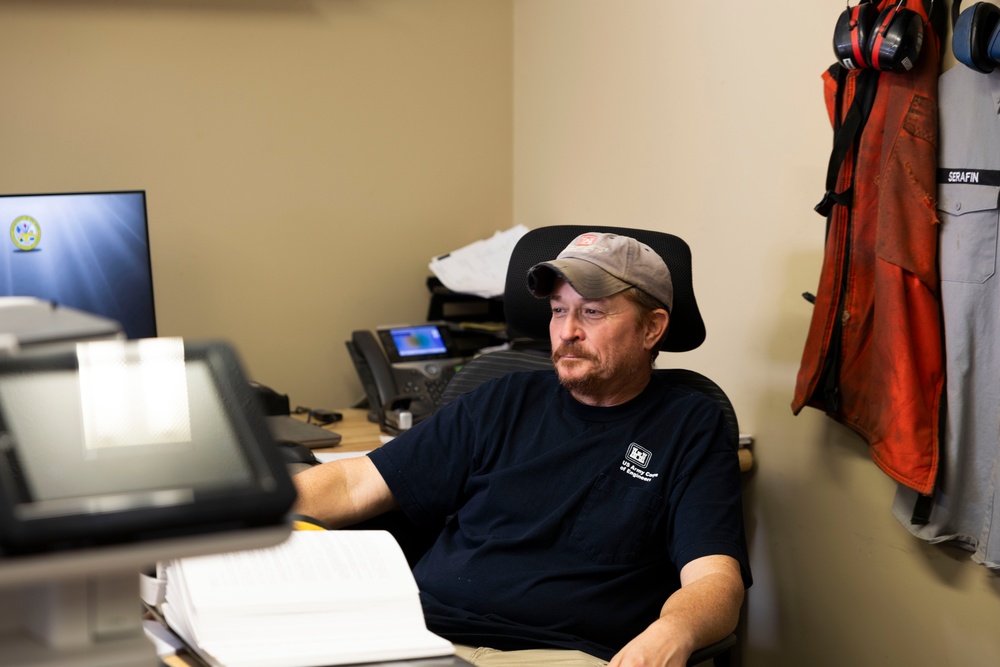 USACE Shenango Maintenance Mechanic clears brush to expand campsites.