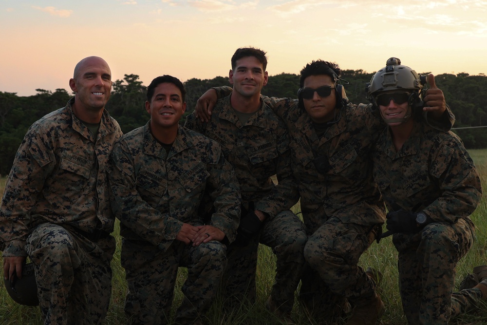 EOTG Marines fast rope during instructor development training 