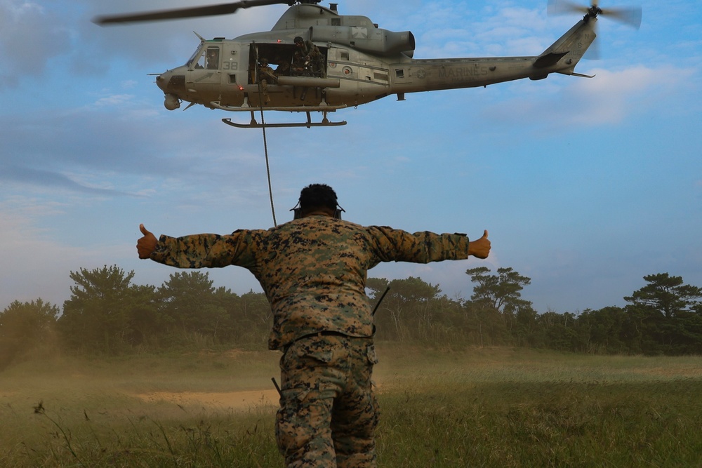 EOTG Marines fast rope during instructor development training 