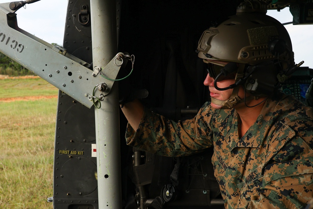 EOTG Marines fast rope during instructor development training 