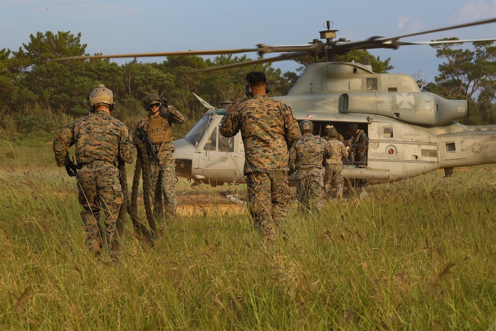 EOTG Marines fast rope during instructor development training 