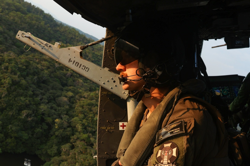 EOTG Marines fast rope during instructor development training 