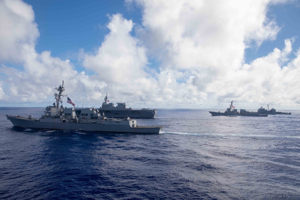 USS Sterett (DDG 104), JS Hyuga (DDH 181), USS Kidd (DDG 100) and USS Robert Smalls (CG 62) sail in formation during Multi-Large Deck Event (MLDE)