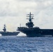 USS Carl Vinson (CVN 70) and USS Ronald Reagan (CVN 76) sail in formation during Multi-Large Deck Event (MLDE)