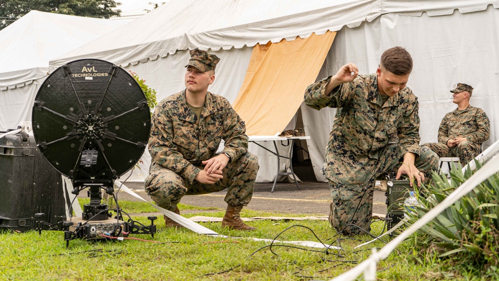 MRF-SEA Marines check signal strength for integrated waveform radio