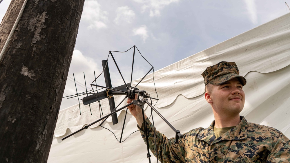 MRF-SEA Marines check signal strength for integrated waveform radio