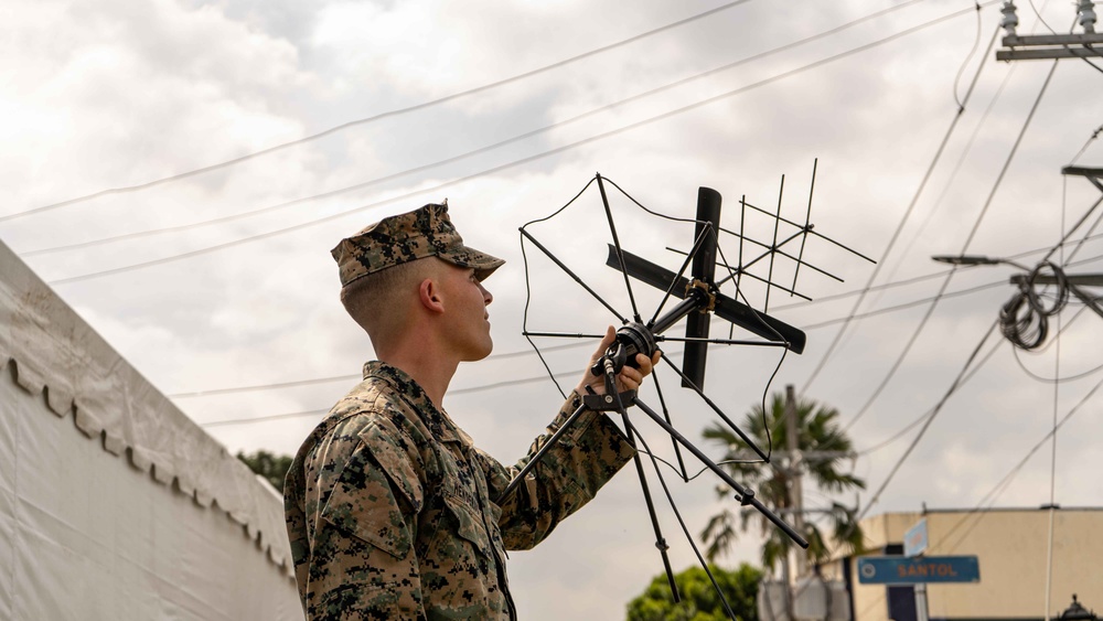 MRF-SEA Marines check signal strength for integrated waveform radio