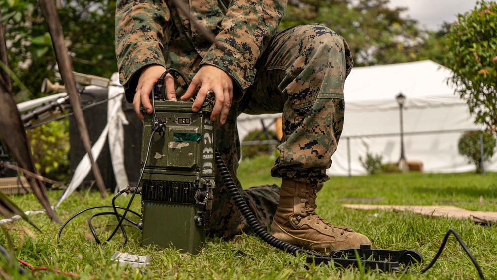 MRF-SEA Marines check signal strength for integrated waveform radio