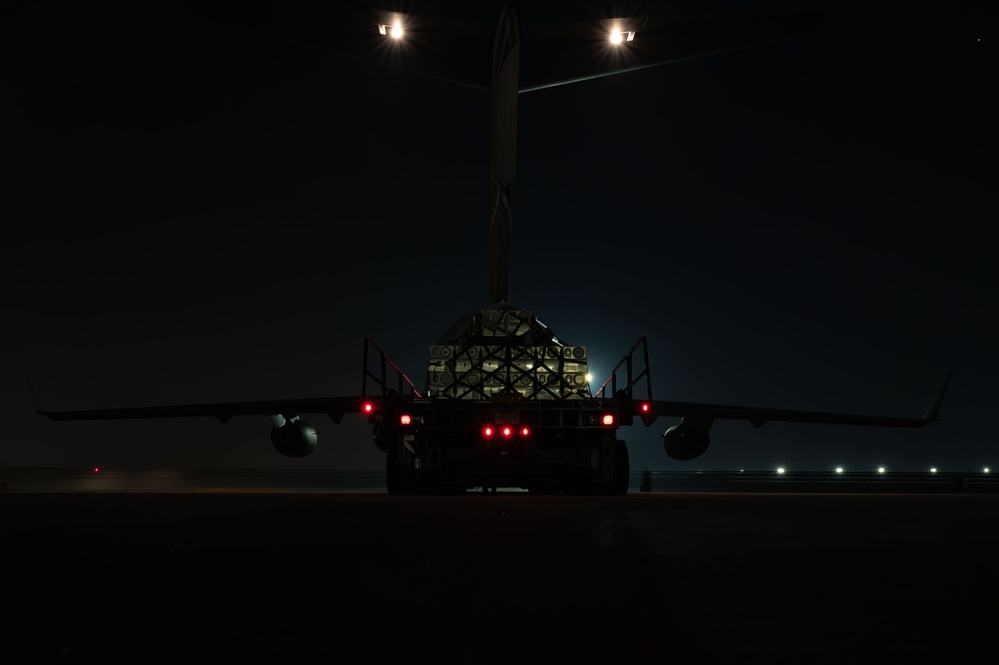 Airmen Load Cargo on C-17 Globemaster III