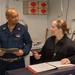 USS Ronald Reagan (CVN 76) Sailors review legal documents