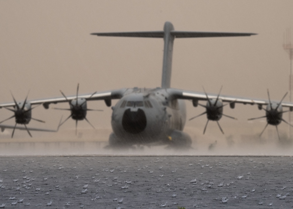 U.S. and Royal Air Forces integrate for cargo unloading, supporting Exercise Ferocious Falcon