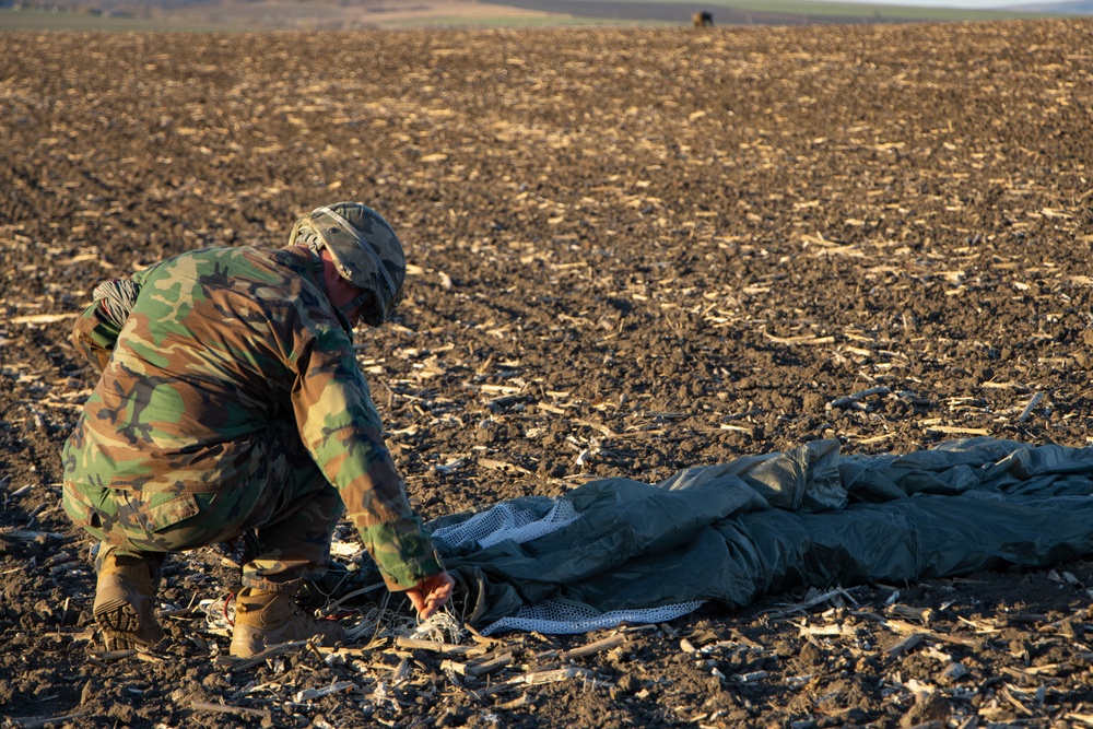 Paratroopers with Special Operations Command Europe jump with partners from Moldova