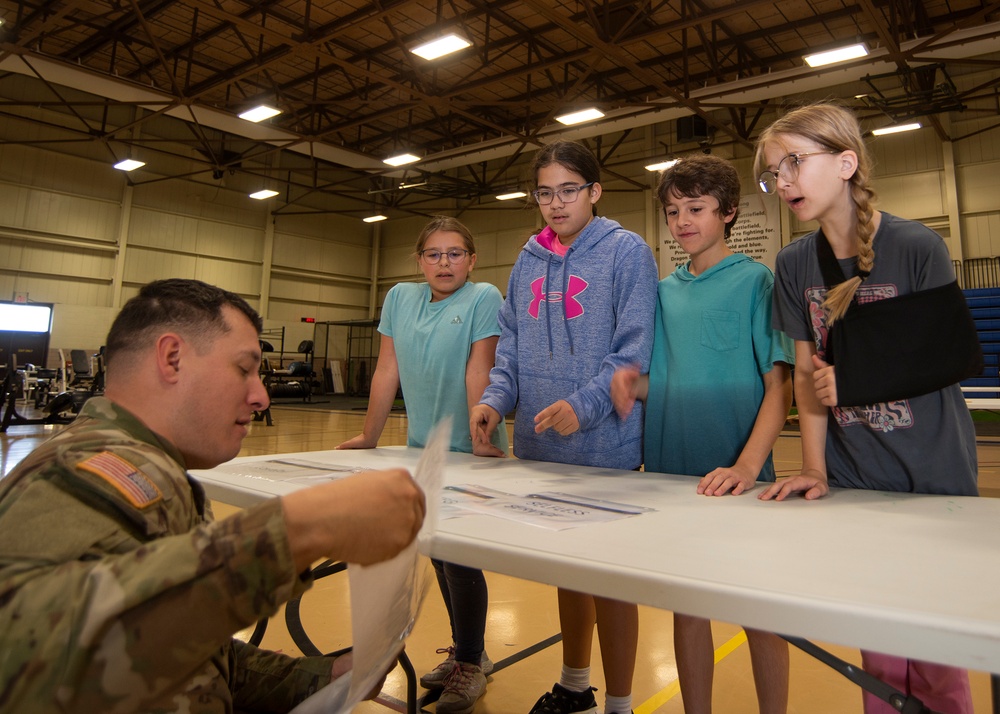 Wood Elementary School fitness club partners with 2-10 Soldiers for modified ACFT event