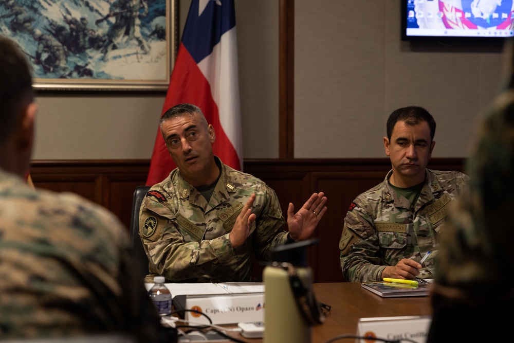 U.S. Marine Corps Lt. Gen. Bellon speaks with U.S. and Chilean Marines during a staff planner working group