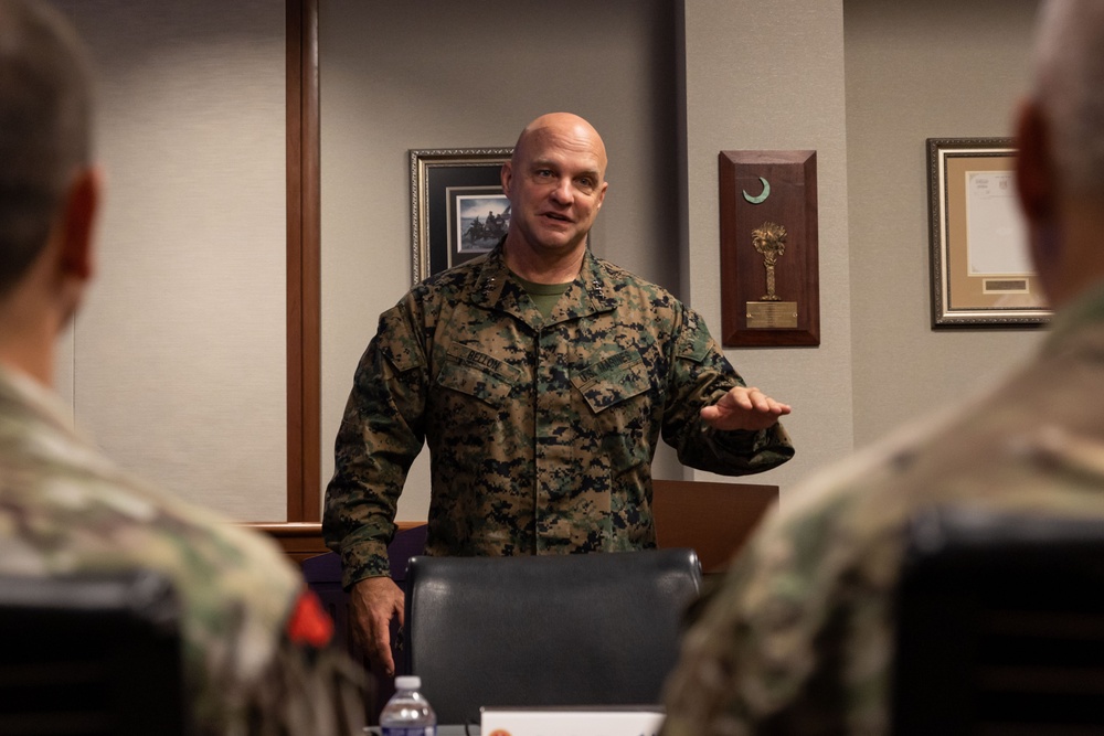 U.S. Marine Corps Lt. Gen. Bellon speaks with U.S. and Chilean Marines during a staff planner working group