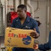 USS Kidd Sailor Moves Stores