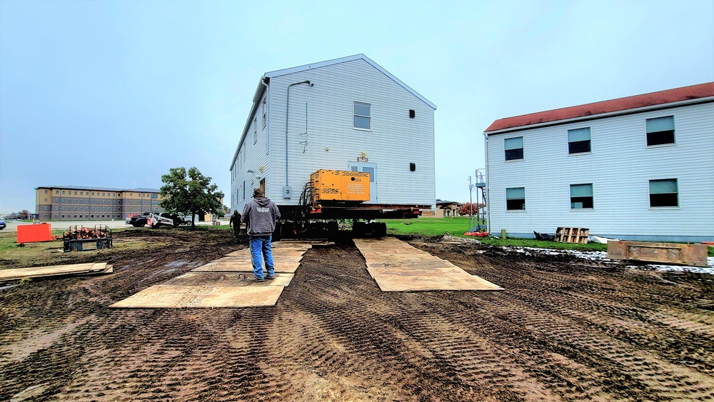 Contractors ‘drive’ World War II-era barracks buildings to new foundations at Fort McCoy