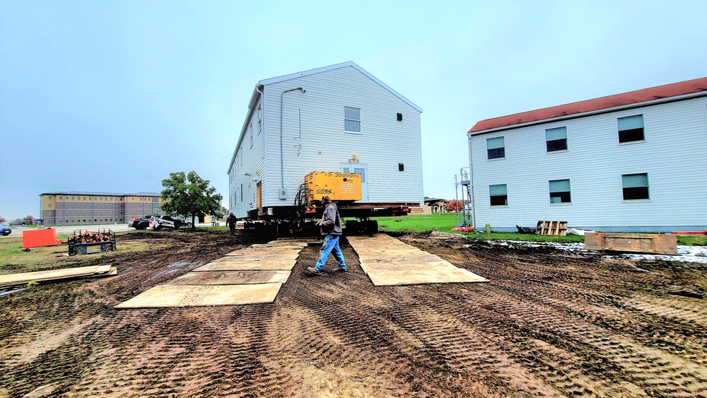 Contractors ‘drive’ World War II-era barracks buildings to new foundations at Fort McCoy