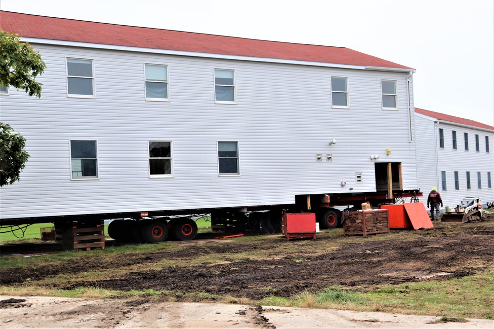 Contractors ‘drive’ World War II-era barracks buildings to new foundations at Fort McCoy