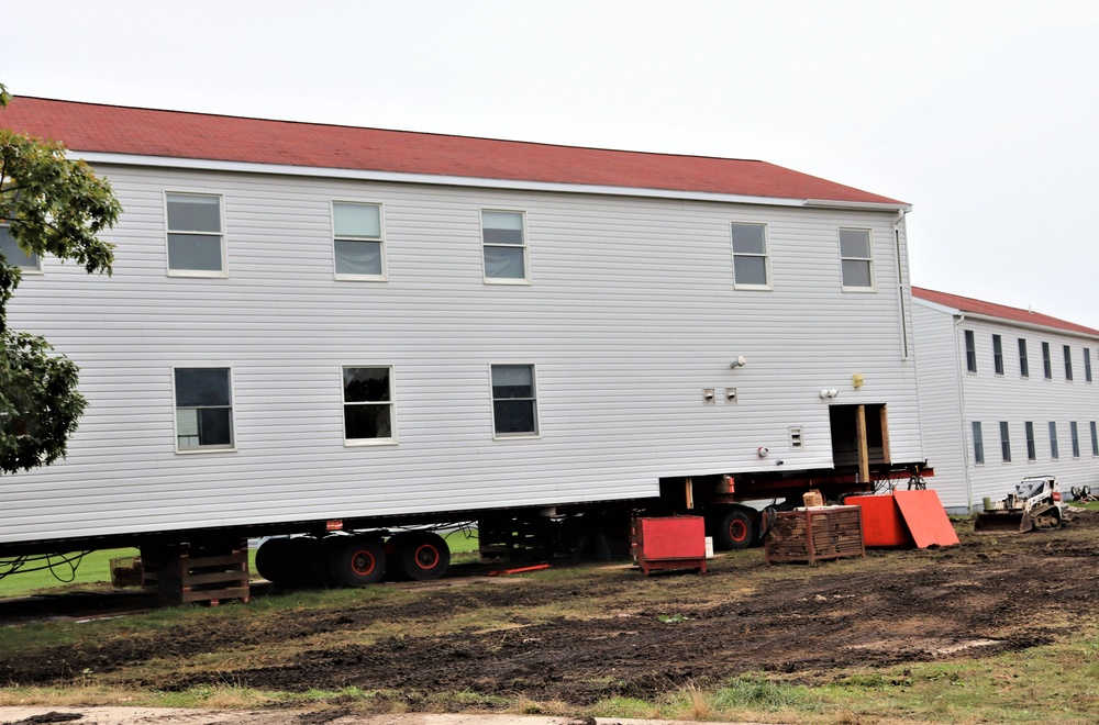 Contractors ‘drive’ World War II-era barracks buildings to new foundations at Fort McCoy