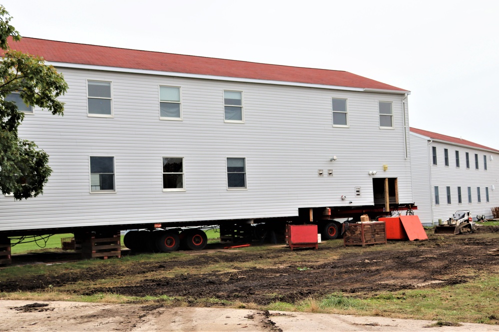 Contractors ‘drive’ World War II-era barracks buildings to new foundations at Fort McCoy