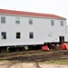 Contractors ‘drive’ World War II-era barracks buildings to new foundations at Fort McCoy