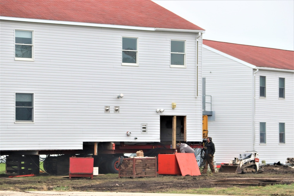 Contractors ‘drive’ World War II-era barracks buildings to new foundations at Fort McCoy