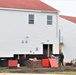 Contractors ‘drive’ World War II-era barracks buildings to new foundations at Fort McCoy