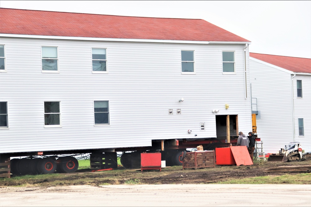 Contractors ‘drive’ World War II-era barracks buildings to new foundations at Fort McCoy