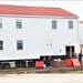 Contractors ‘drive’ World War II-era barracks buildings to new foundations at Fort McCoy