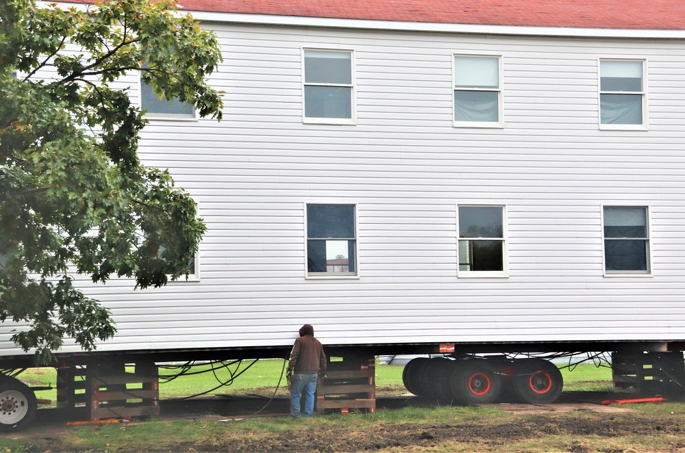 Contractors ‘drive’ World War II-era barracks buildings to new foundations at Fort McCoy