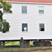 Contractors ‘drive’ World War II-era barracks buildings to new foundations at Fort McCoy